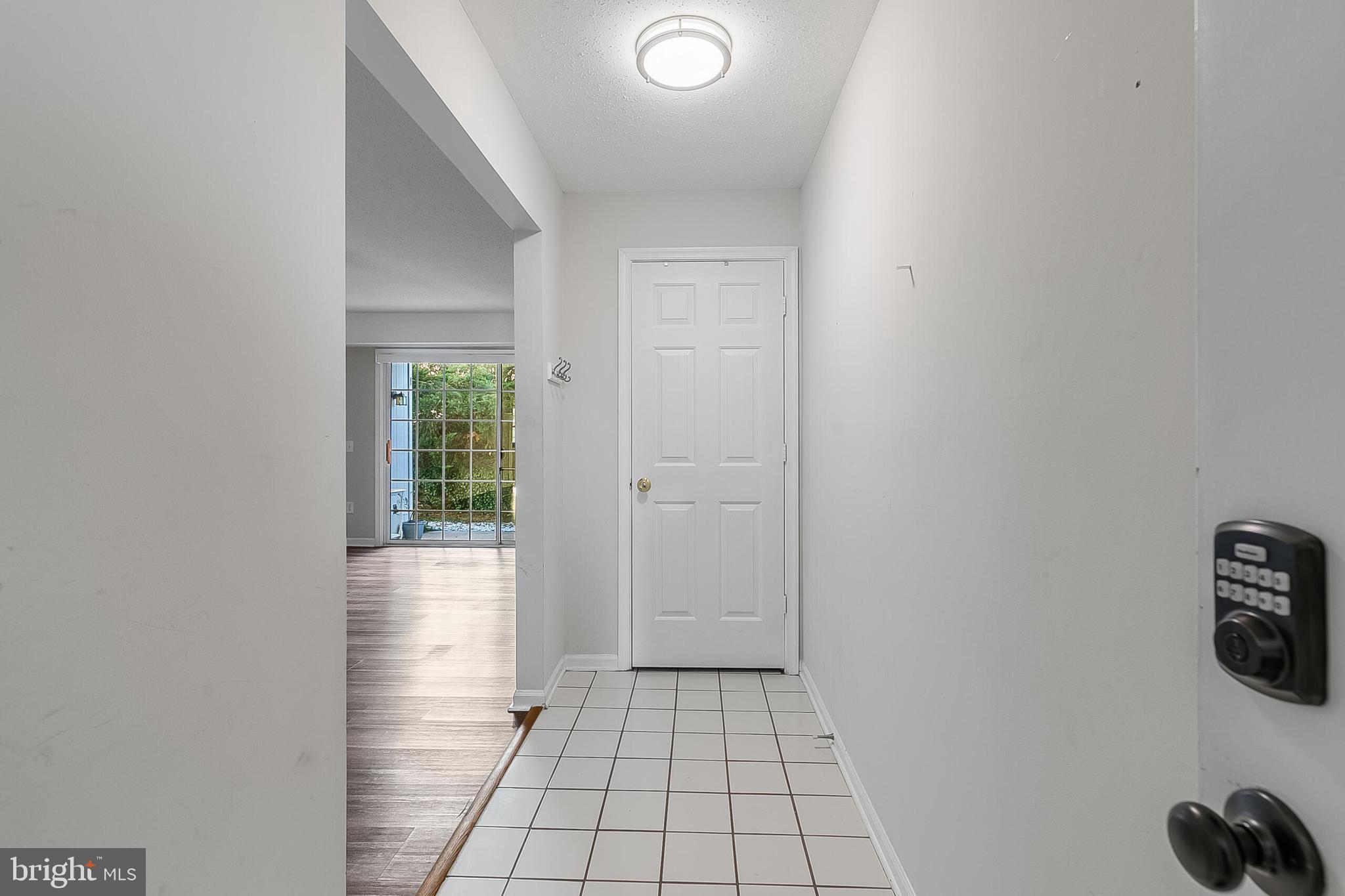 110 Prosperity Avenue Southeast, Unit A Leesburg, VA 20175 - Photo 8 of 22 a view of an empty room and window