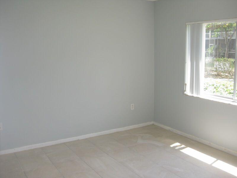 721 North Pine Island Road, Unit 116 Plantation, FL 33324 - Photo 11 of 23 an empty room with a window