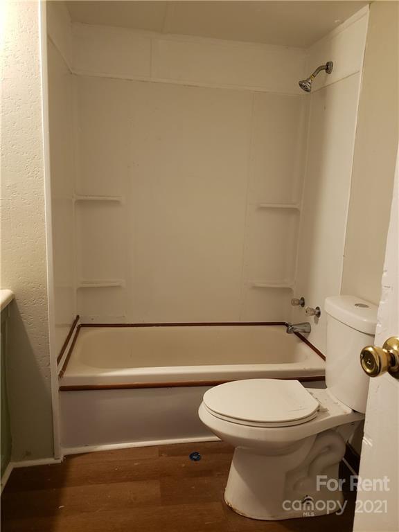 1158 Wagon Wheel Road, Unit 5 Hickory, NC 28602 - Photo 8 of 10 a bathroom with a toilet and a shower