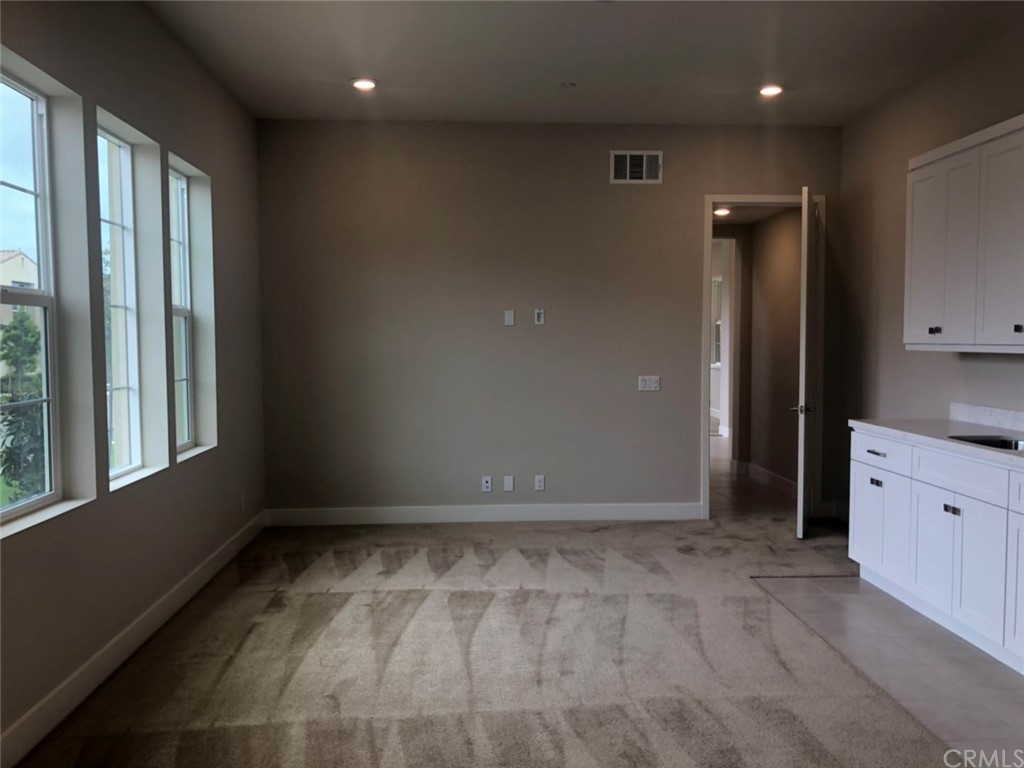 117 Swift Irvine, CA 92618 - Photo 4 of 4 a view of an empty room with a window