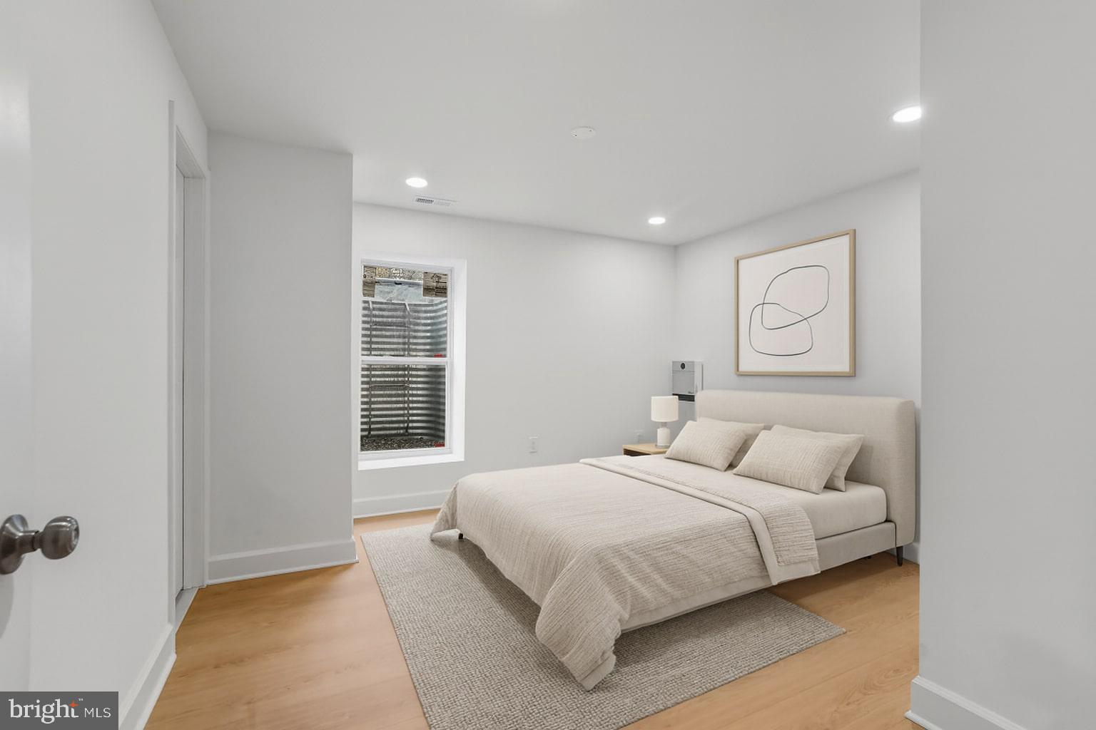 8728 # Courthouse Road Vienna, VA 22182 - Photo 17 of 34 a bedroom with a bed and a window