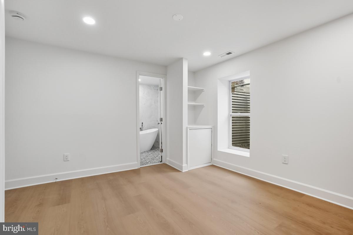 8728 # Courthouse Road Vienna, VA 22182 - Photo 19 of 34 a view of a livingroom with a bathroom