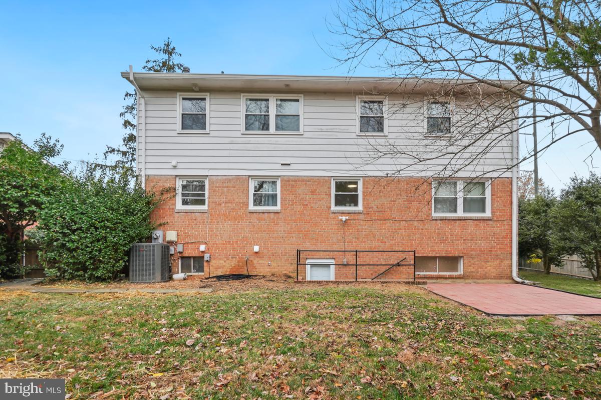 8728 # Courthouse Road Vienna, VA 22182 - Photo 2 of 34 a front view of a house with a yard