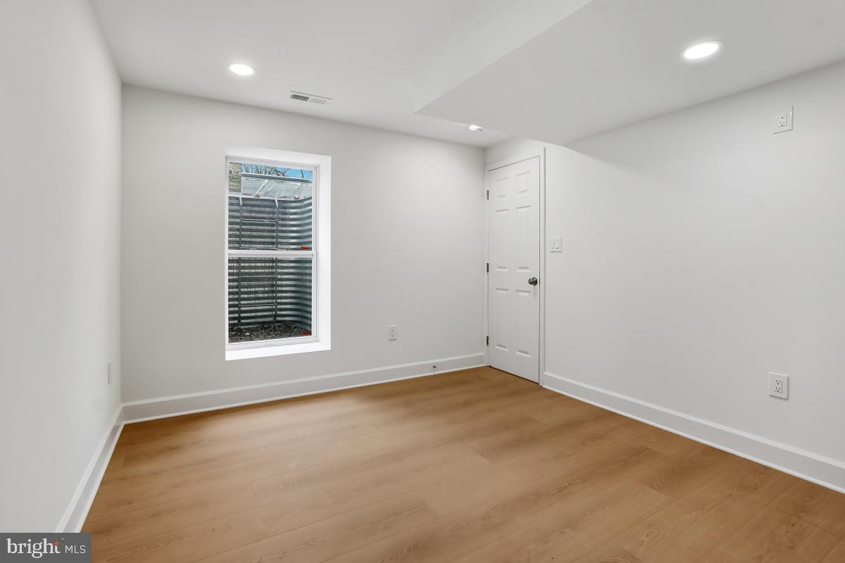 8728 # Courthouse Road Vienna, VA 22182 - Photo 30 of 34 an empty room with a window