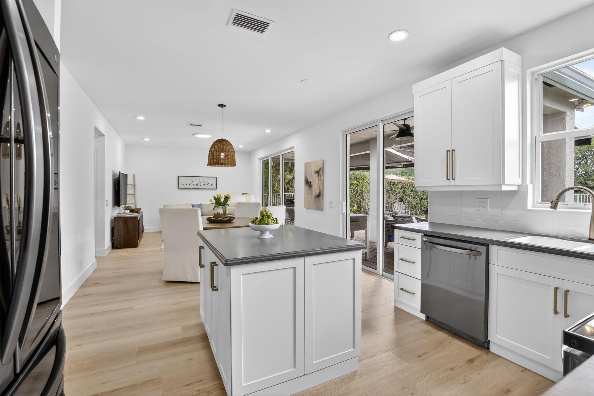 4299 Laurel Ridge Circle Weston, FL 33331 - Photo 7 of 103 a kitchen with stainless steel appliances granite countertop a sink and cabinets