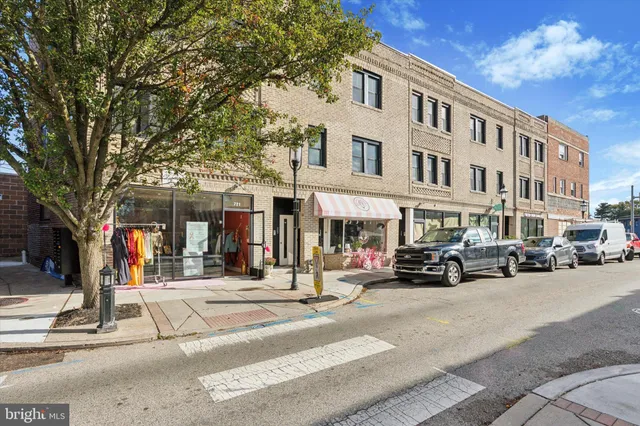 a view of a building with a street