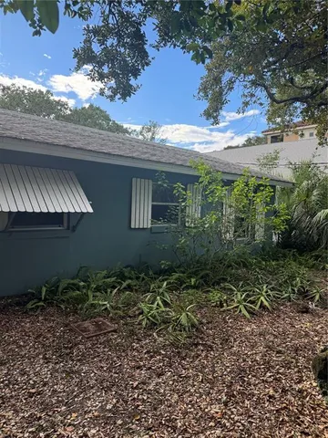 a view of backyard with green space