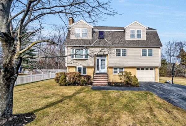 15 Lillian Road Lexington, MA 02420 - Photo 1 of 30 a front view of a house with a yard
