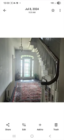 a black and white photo of a living room