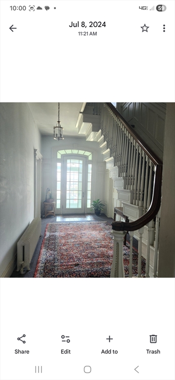 91 Ocean Street, Unit 1 Lynn, MA 01902 - Photo 6 of 9 a black and white photo of a living room