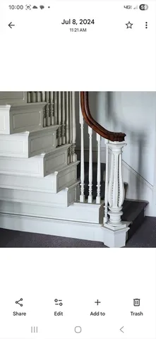 a black and white photo of a living room