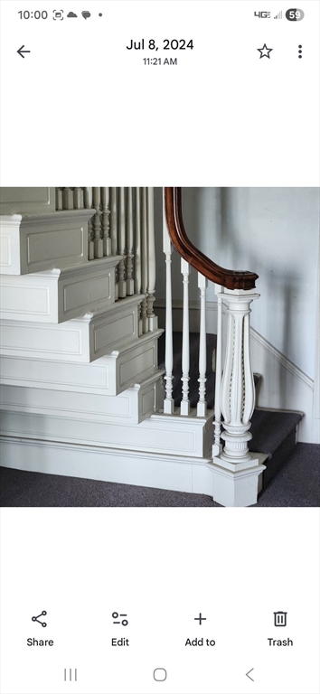 91 Ocean Street, Unit 1 Lynn, MA 01902 - Photo 7 of 9 a black and white photo of a living room