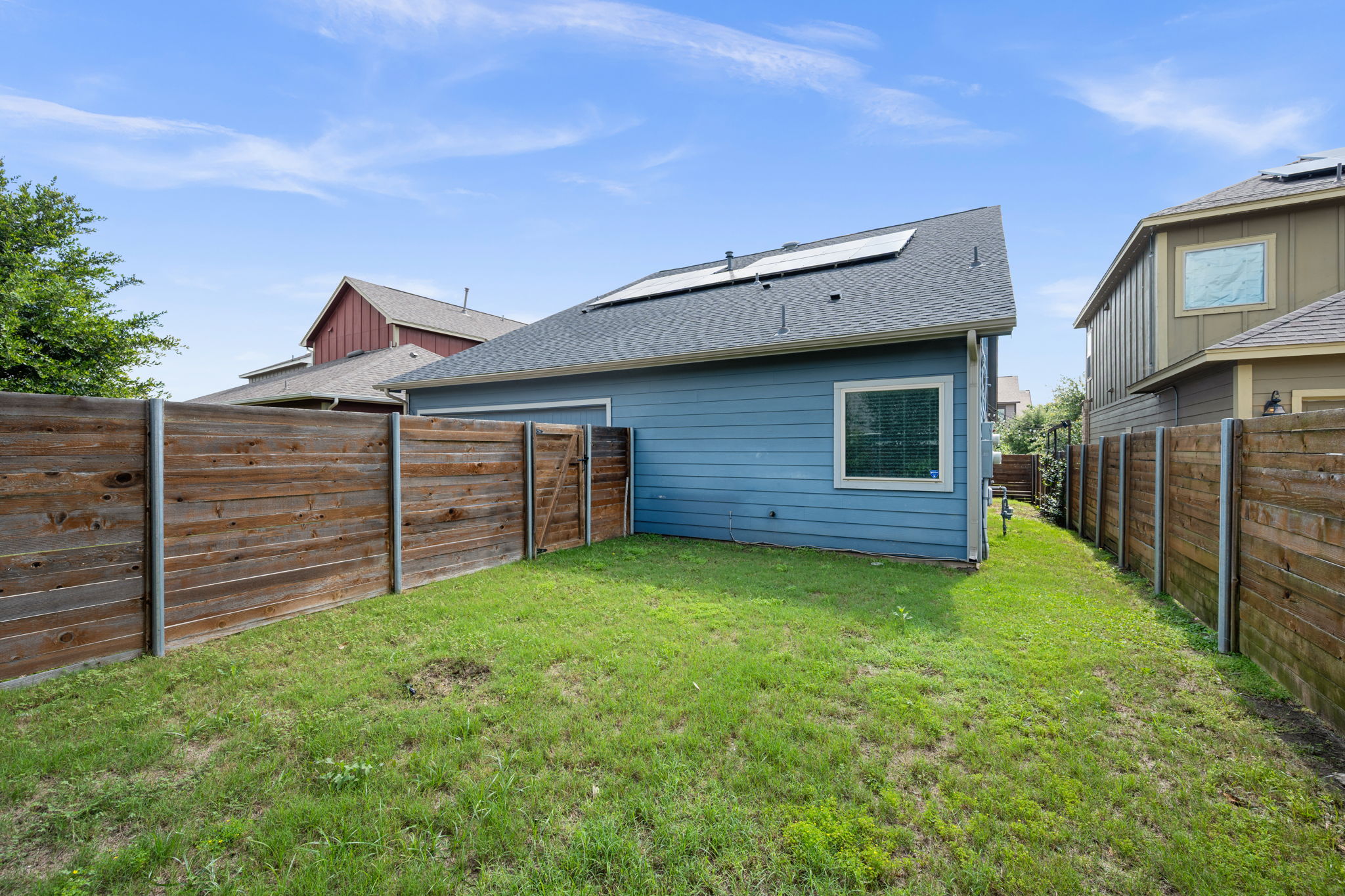 8800 Slater Drive Austin, TX 78747 - Photo 28 of 40 a view of a backyard of the house