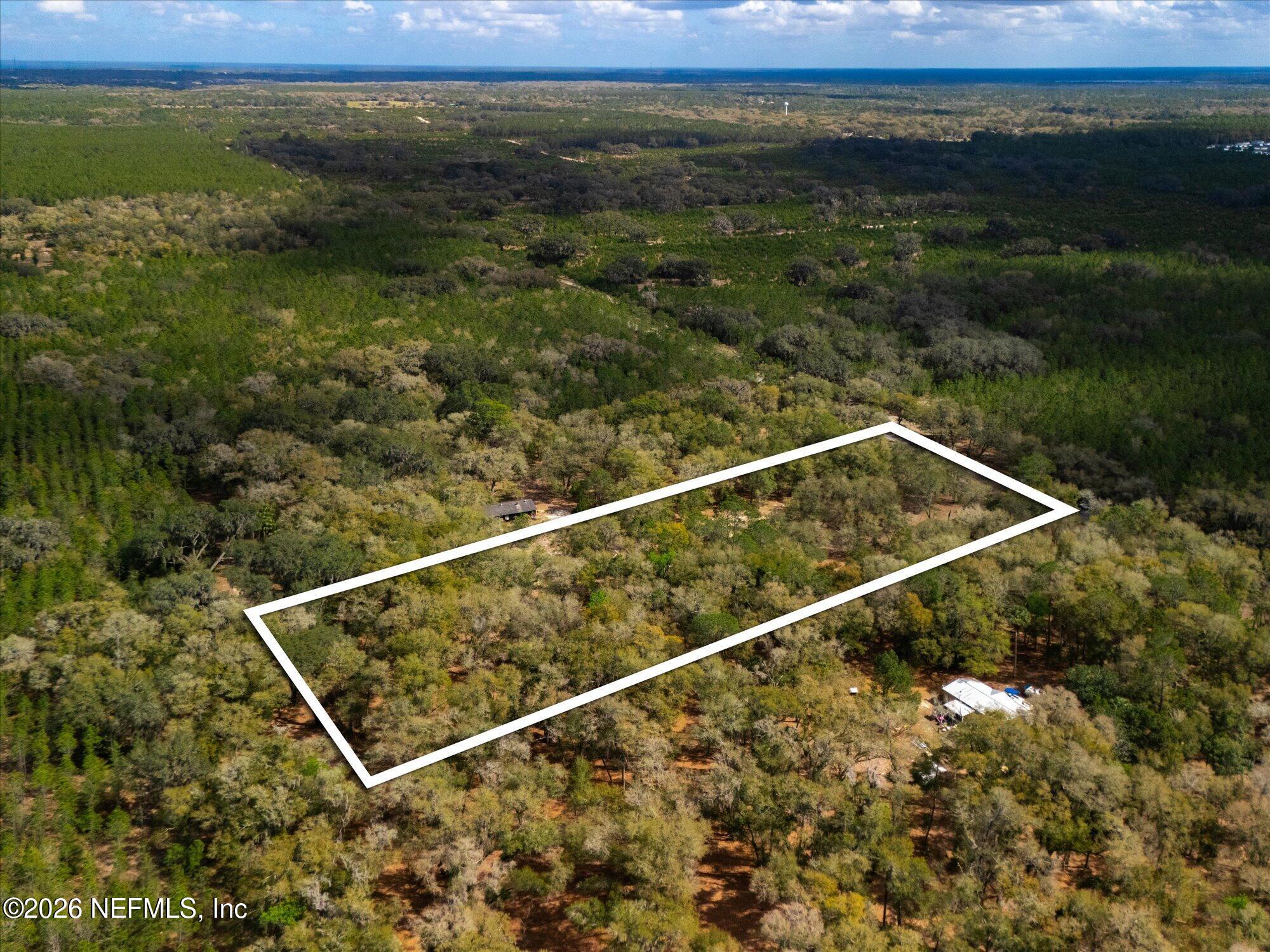 Tbd Tbd Old Welaka (parcel B) Road Satsuma, FL 32189 - Photo 18 of 26 a view of a two chair near an ocean
