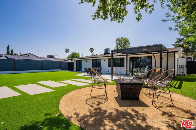 a kitchen that has a stove and a microwave