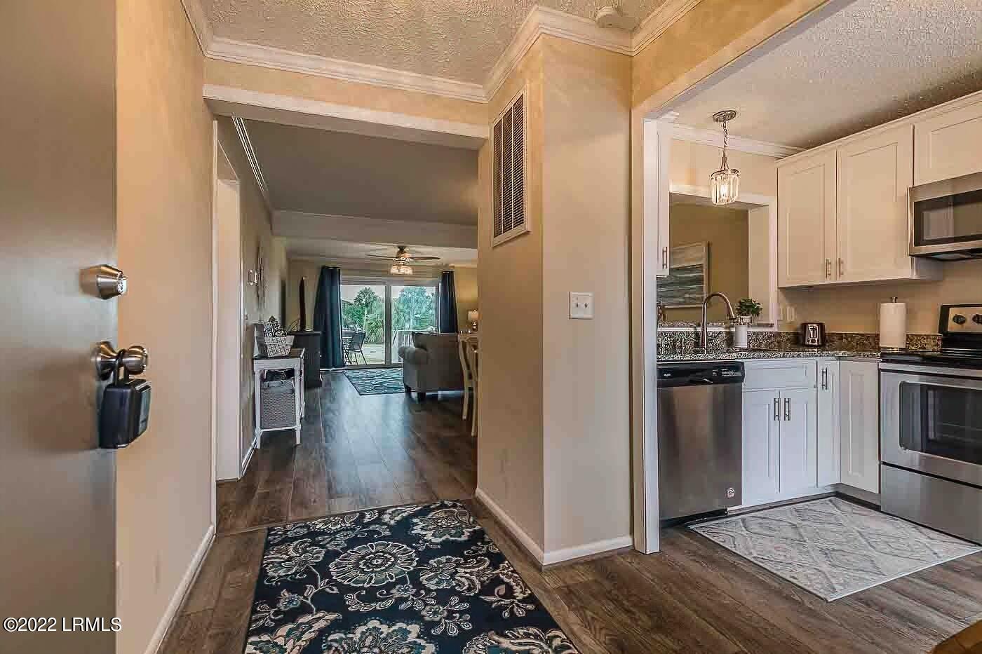 6 Cedar Reef, Unit C103 Harbor Island, SC 29920 - Photo 2 of 37 4 Entry