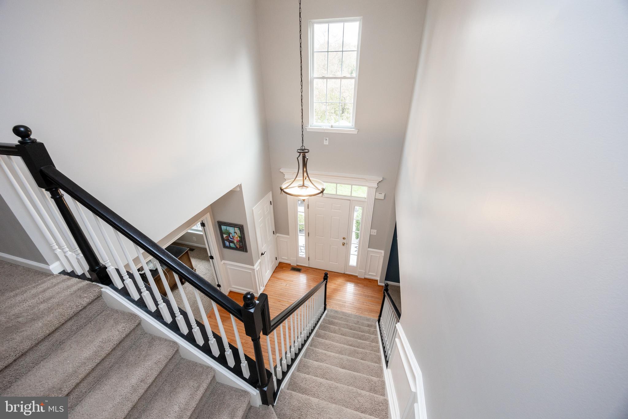 113 Blue Ribbon Way Downingtown, PA 19335 - Photo 20 of 50 a view of an entryway with wooden floor