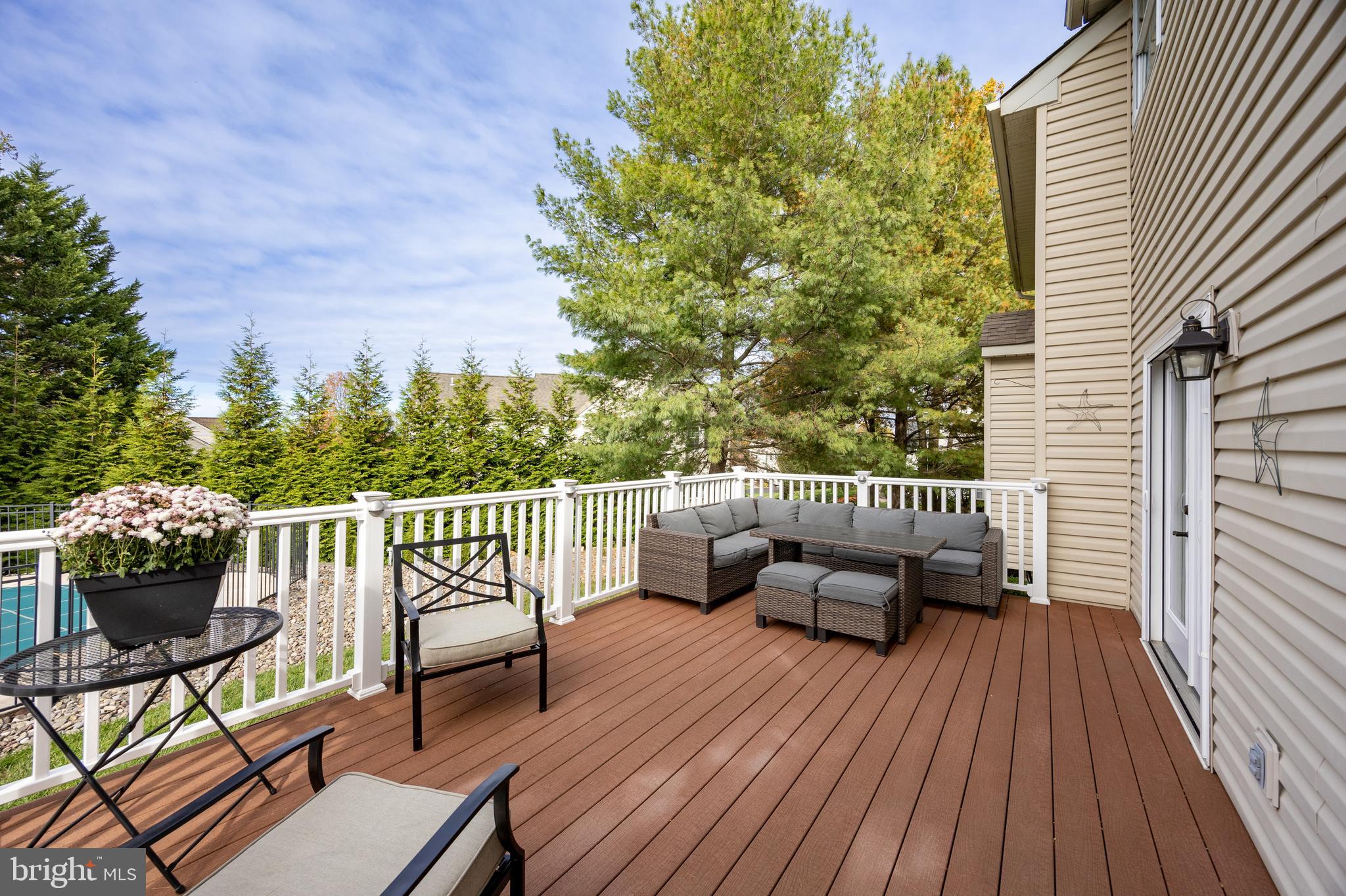 113 Blue Ribbon Way Downingtown, PA 19335 - Photo 42 of 50 a balcony with wooden floor and furniture