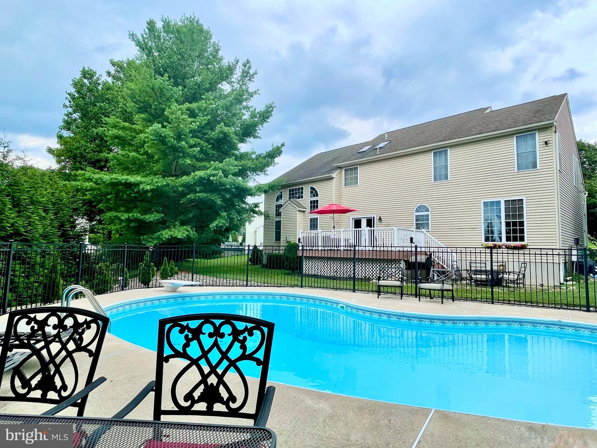 113 Blue Ribbon Way Downingtown, PA 19335 - Photo 44 of 50 a house view with swimming pool and furniture