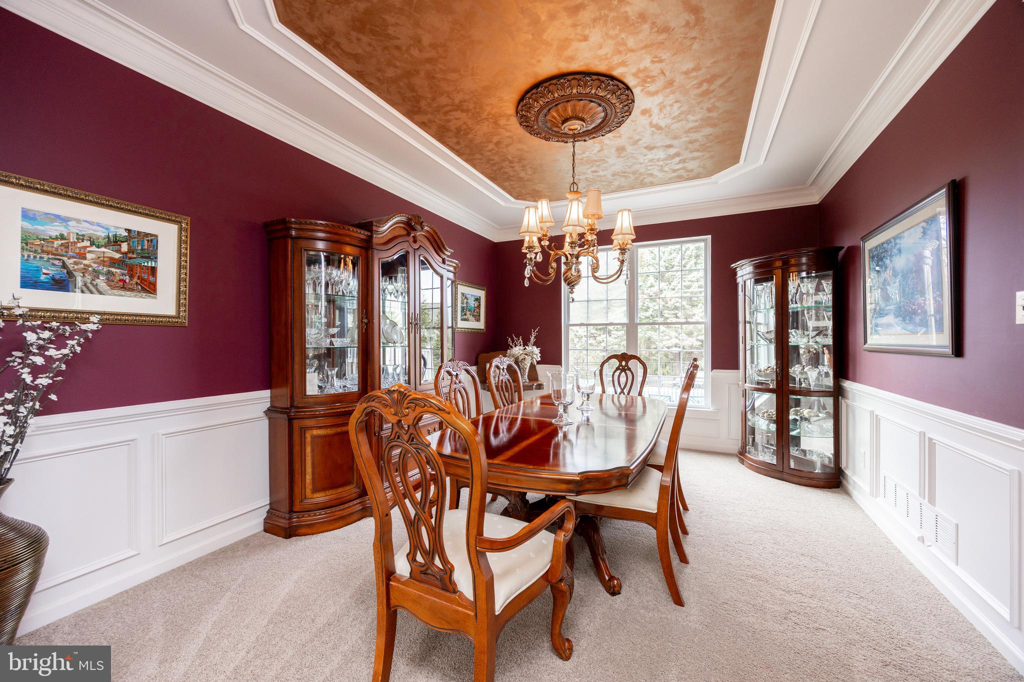 113 Blue Ribbon Way Downingtown, PA 19335 - Photo 5 of 50 a dining room with furniture a chandelier and window