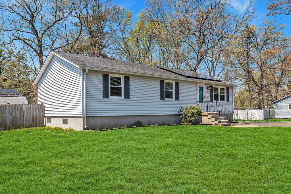 242 Gilbert Avenue Springfield, MA 01119 - Photo 2 of 38 a front view of house with a garden