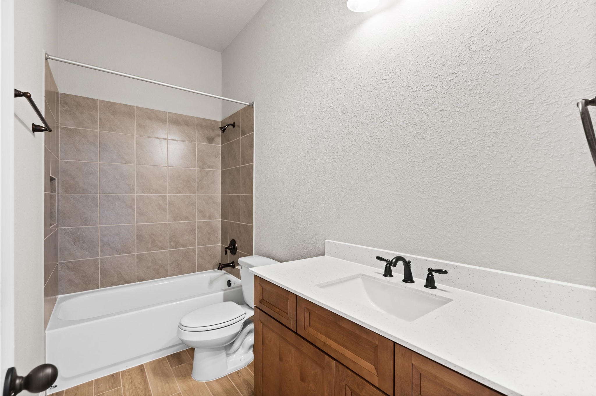 1225 Friendship Trail Seabrook, TX 77586 - Photo 17 of 22 a bathroom with a sink a toilet and bathtub