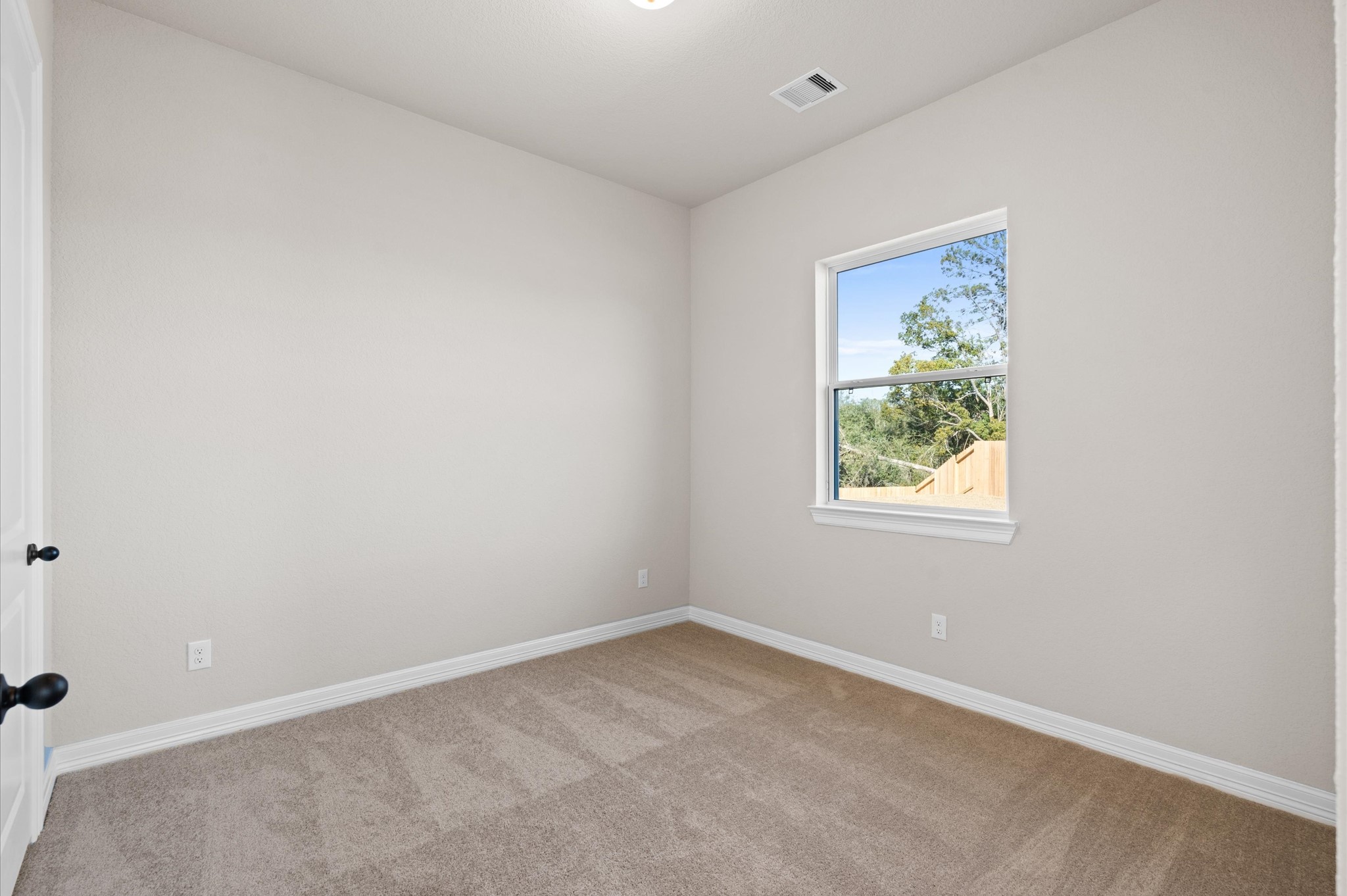 1225 Friendship Trail Seabrook, TX 77586 - Photo 19 of 22 an empty room with a window