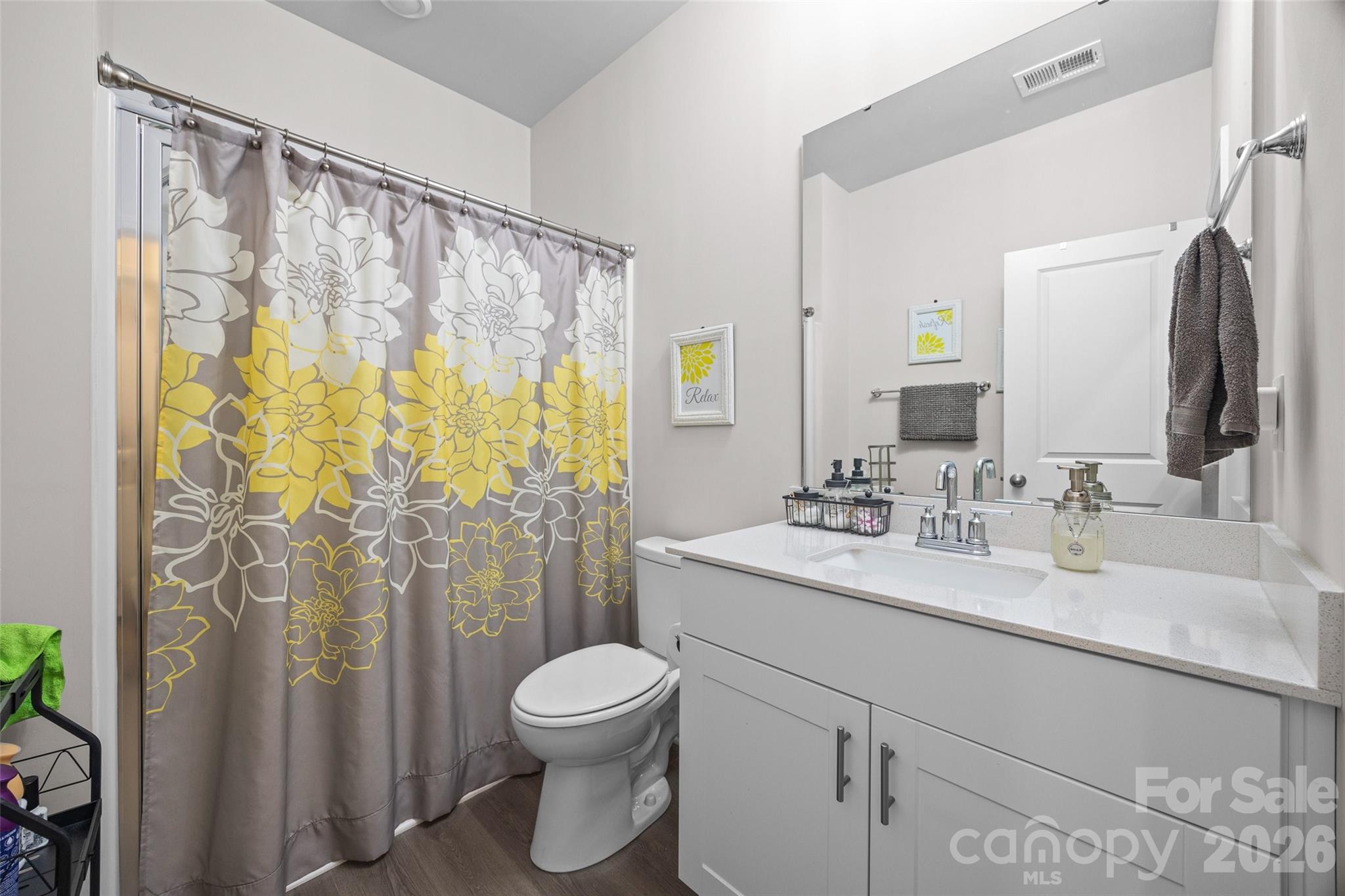 359 Olympia Way York, SC 29745 - Photo 13 of 27 a bathroom with a granite countertop sink toilet and shower