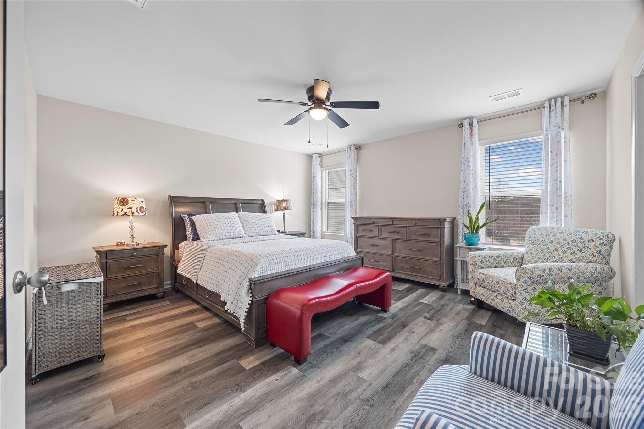 359 Olympia Way York, SC 29745 - Photo 21 of 27 a bedroom with furniture and wooden floor