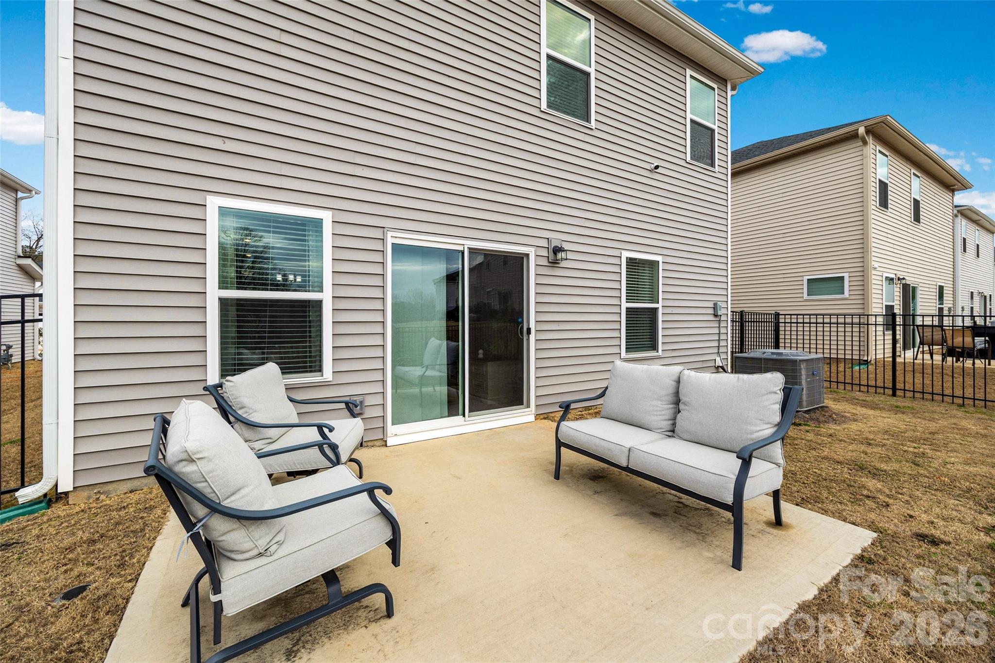 359 Olympia Way York, SC 29745 - Photo 25 of 27 a view of a patio with a couch and a potted plant