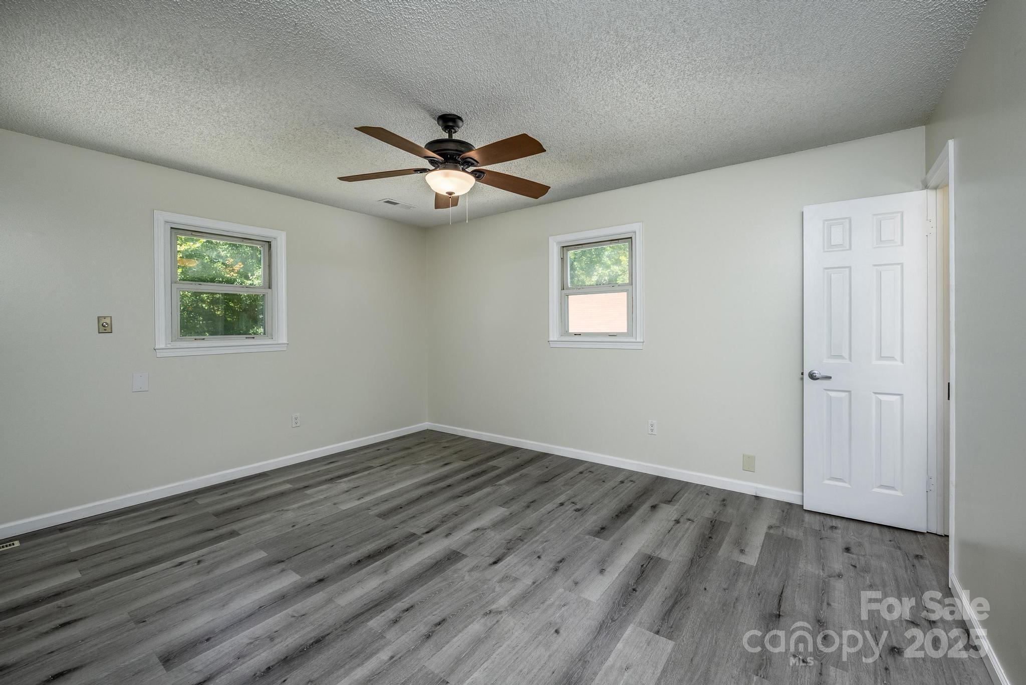 160 Clairmont Road Salisbury, NC 28146 - Photo 16 of 42 a view of empty room with wooden floor