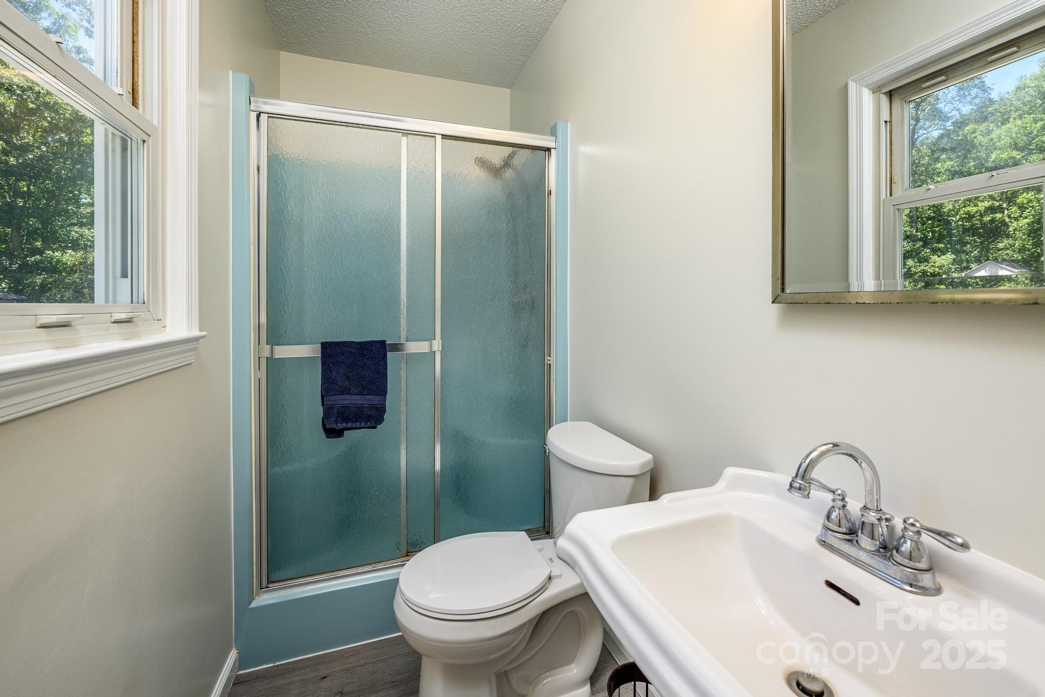 160 Clairmont Road Salisbury, NC 28146 - Photo 17 of 42 a bathroom with a sink and a mirror