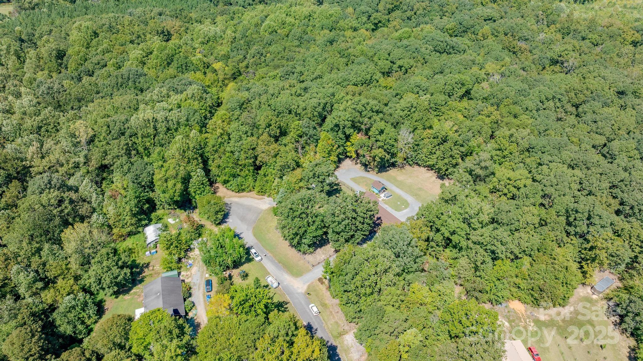 160 Clairmont Road Salisbury, NC 28146 - Photo 2 of 42 an aerial view of residential house with outdoor space and trees all around
