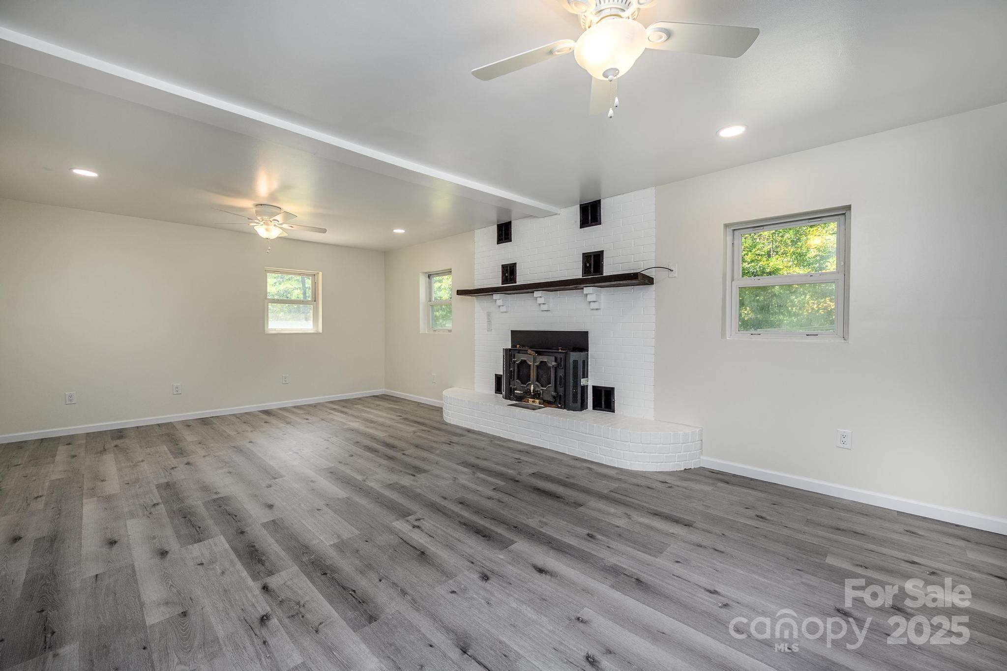 160 Clairmont Road Salisbury, NC 28146 - Photo 24 of 42 a view of empty room with wooden floor and fan