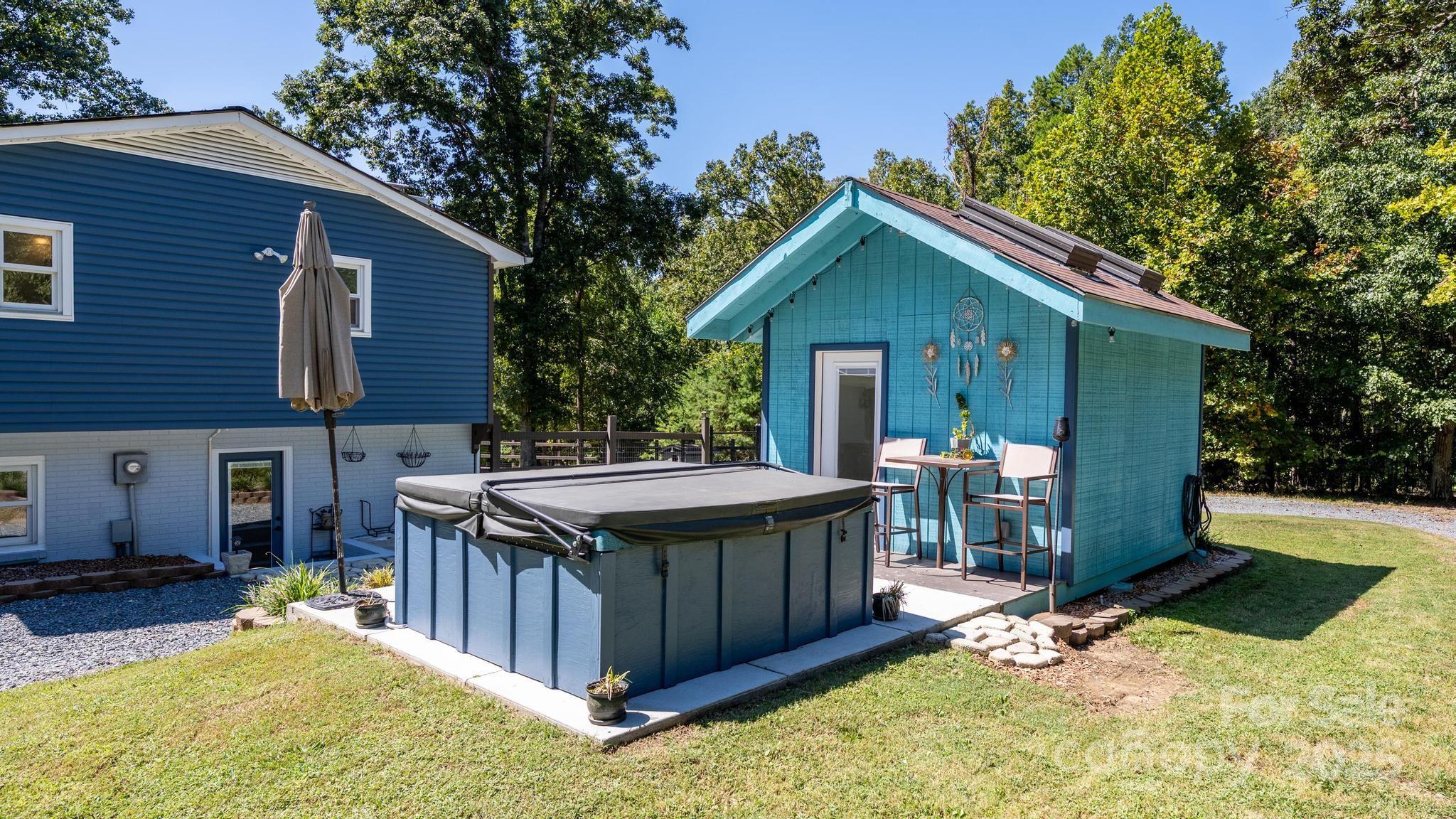 160 Clairmont Road Salisbury, NC 28146 - Photo 30 of 42 a view of backyard with a tub and wooden fence