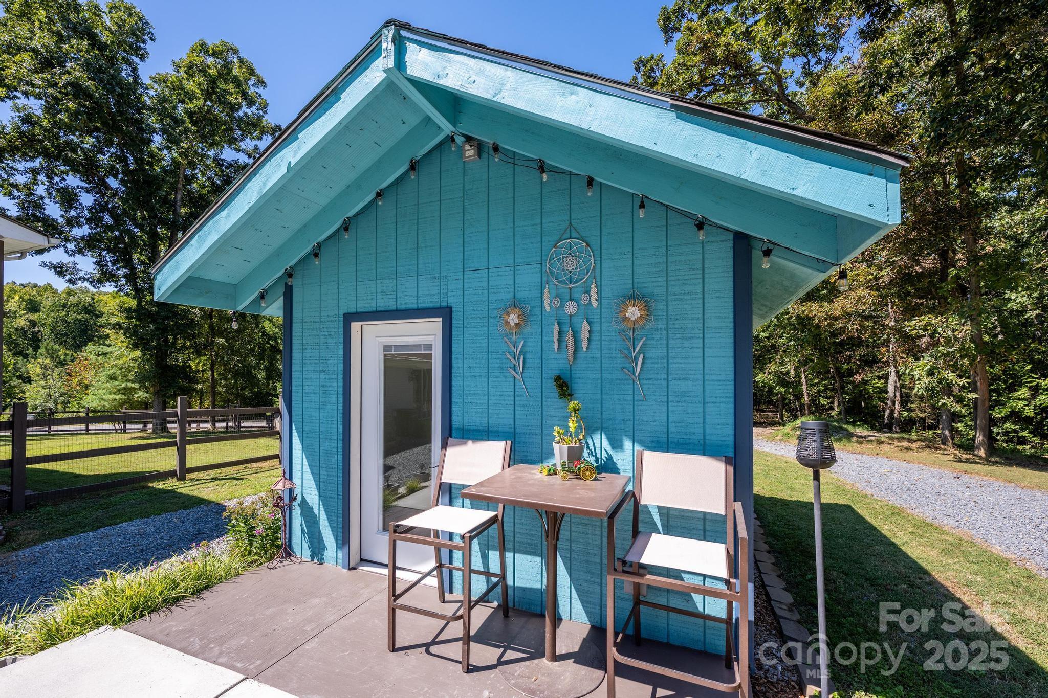 160 Clairmont Road Salisbury, NC 28146 - Photo 31 of 42 a view of a chair and table in backyard of the house