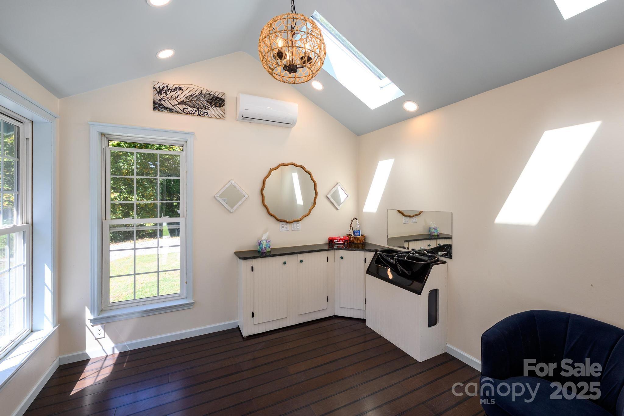 160 Clairmont Road Salisbury, NC 28146 - Photo 32 of 42 a kitchen with stainless steel appliances granite countertop a stove a sink and a large window