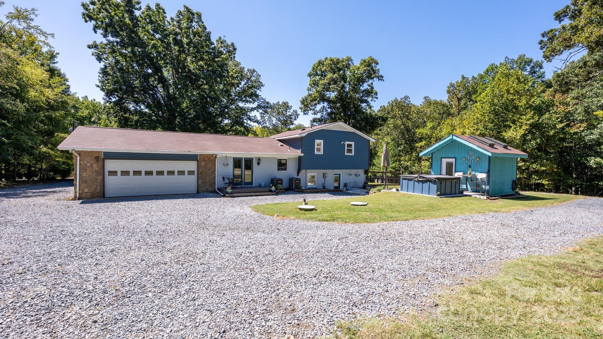 160 Clairmont Road Salisbury, NC 28146 - Photo 33 of 42 a view of house with outdoor space and swimming pool