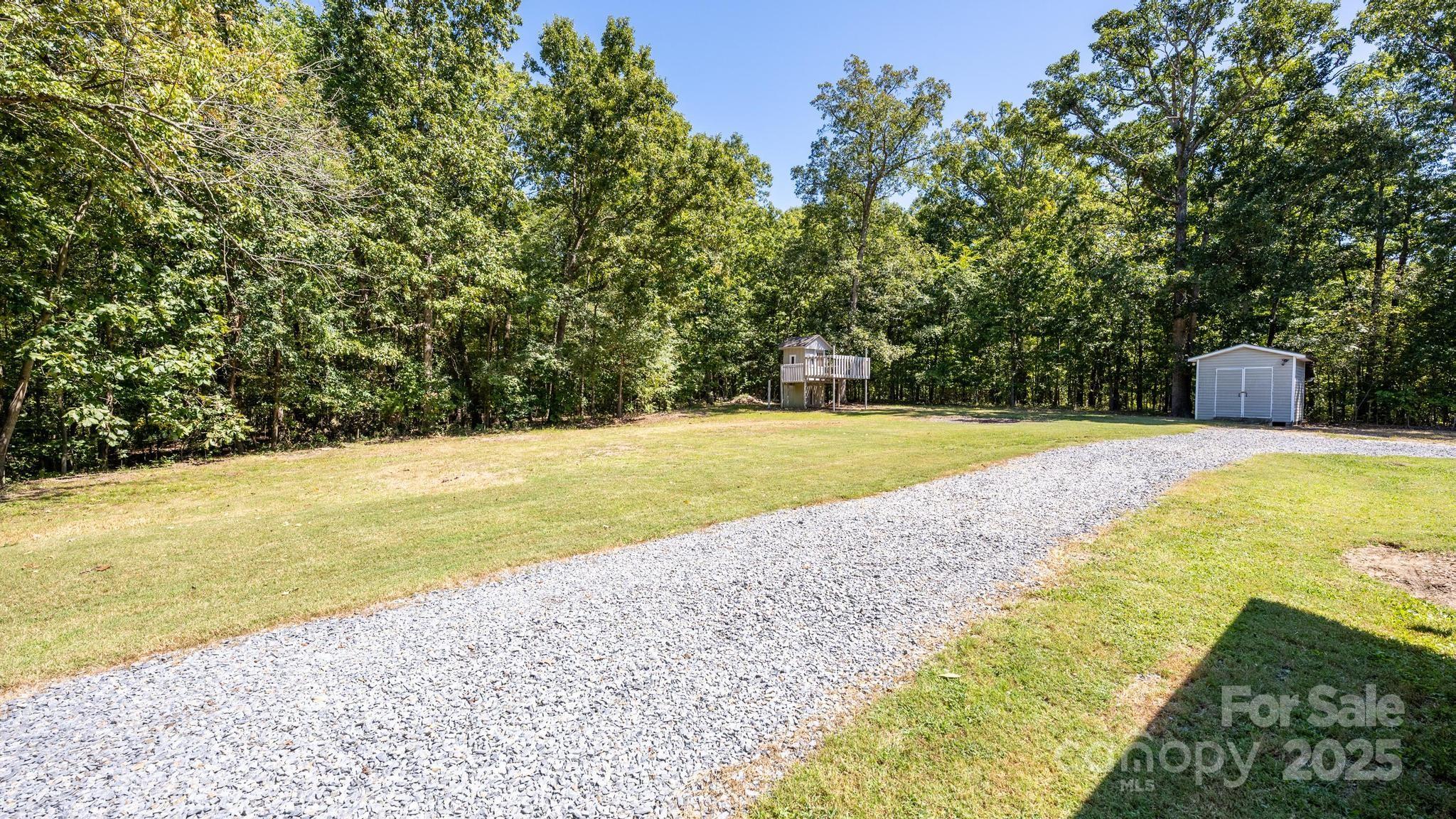 160 Clairmont Road Salisbury, NC 28146 - Photo 34 of 42 a view of a swimming pool with an outdoor space and seating area
