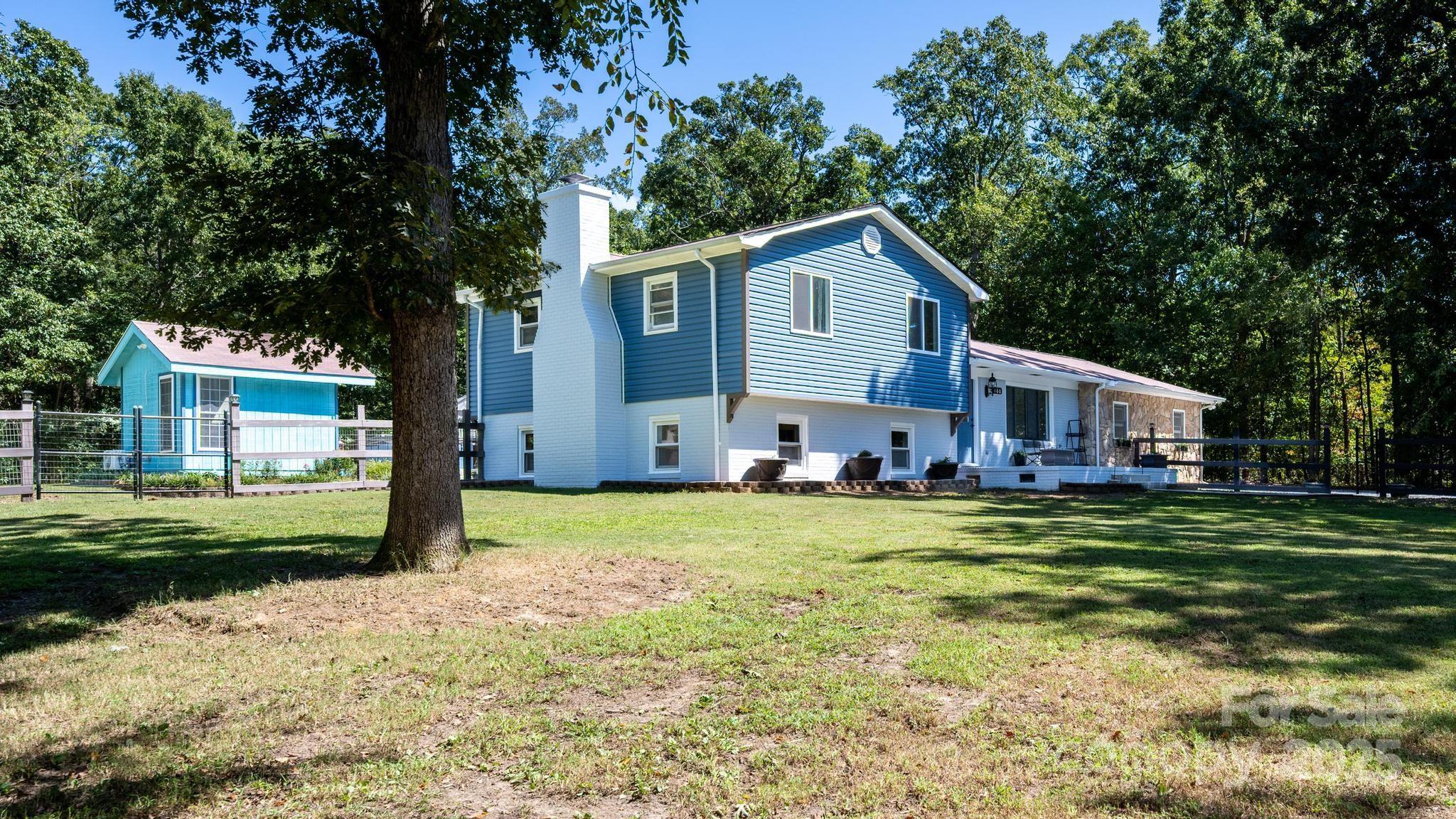 160 Clairmont Road Salisbury, NC 28146 - Photo 4 of 42 a view of a house with a yard