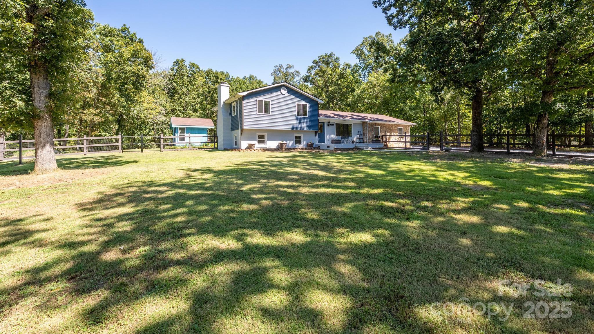 160 Clairmont Road Salisbury, NC 28146 - Photo 5 of 42 a front view of a house with garden