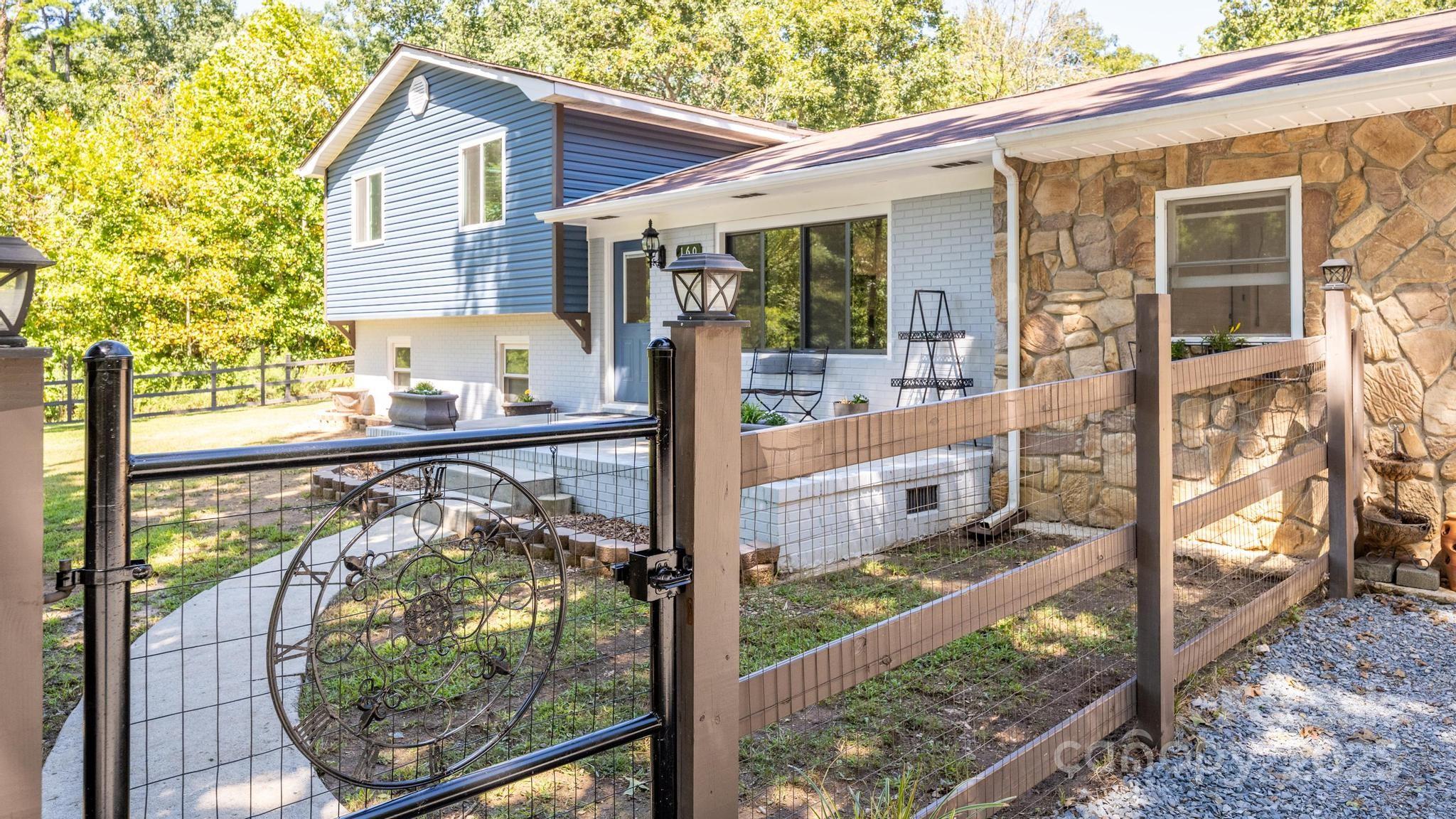 160 Clairmont Road Salisbury, NC 28146 - Photo 7 of 42 a view of a small deck front of house