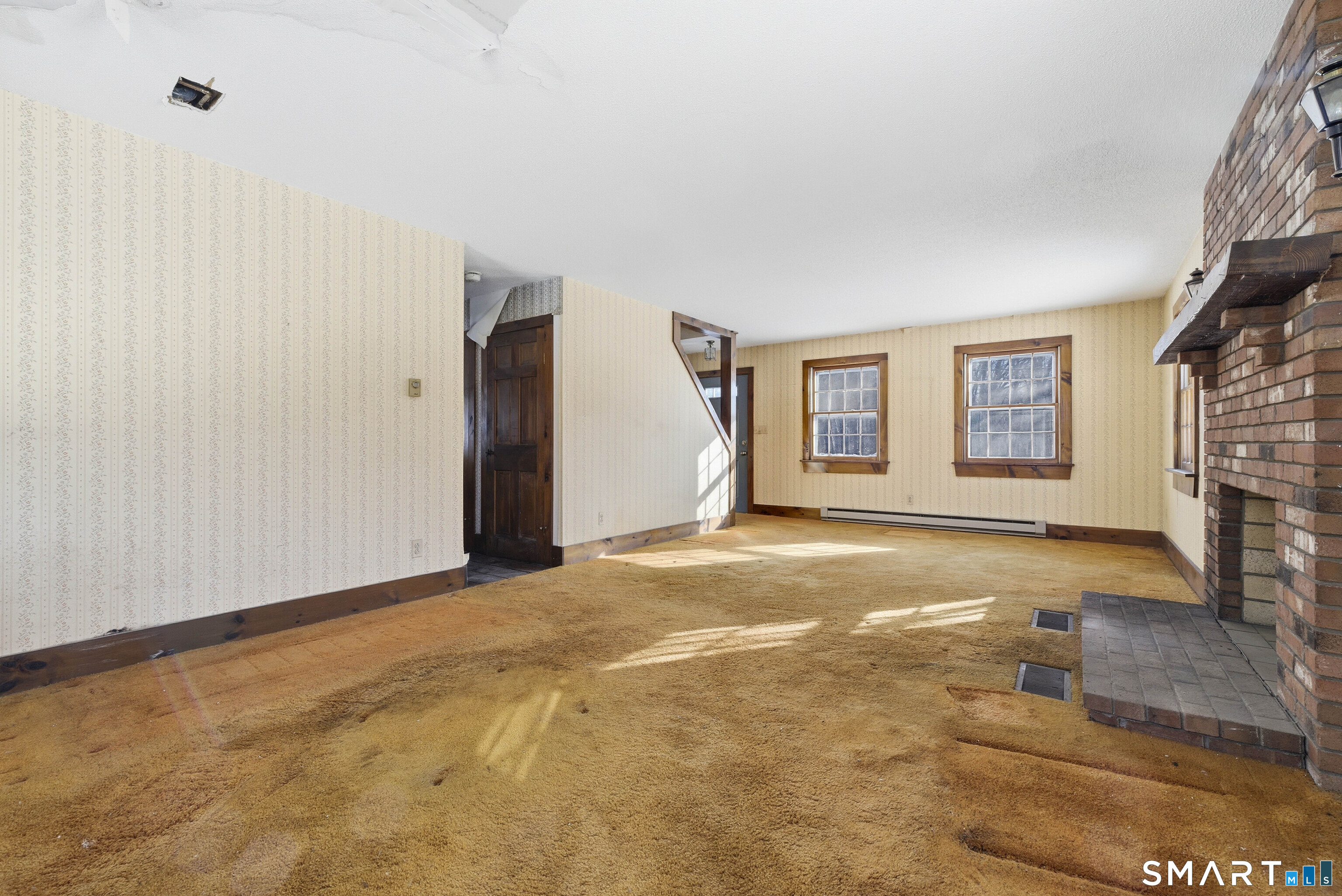 115 Melrose Road East Windsor, CT 06016 - Photo 11 of 28 a view of empty room with fireplace