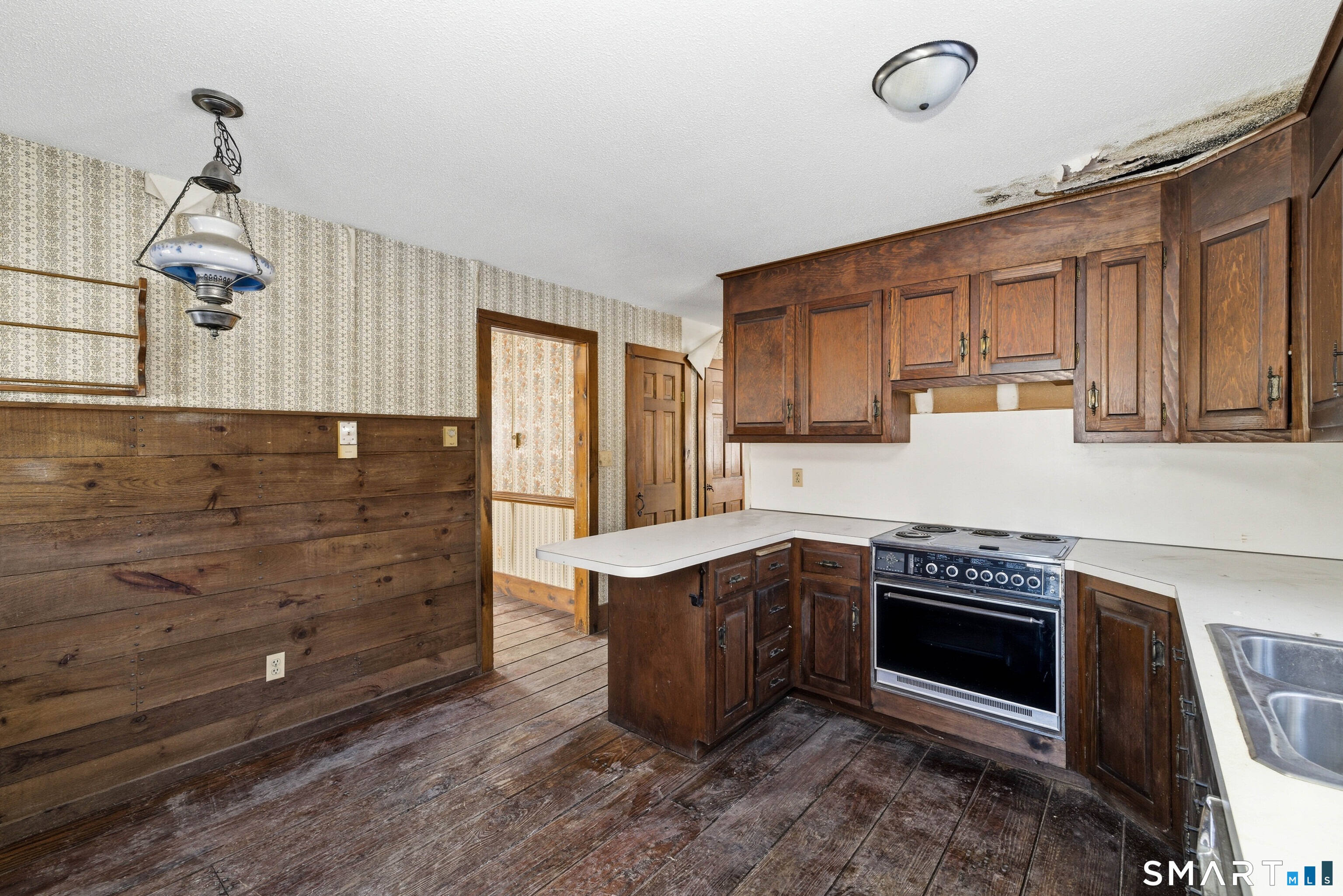 115 Melrose Road East Windsor, CT 06016 - Photo 19 of 28 a kitchen with stainless steel appliances granite countertop a stove a sink and a refrigerator