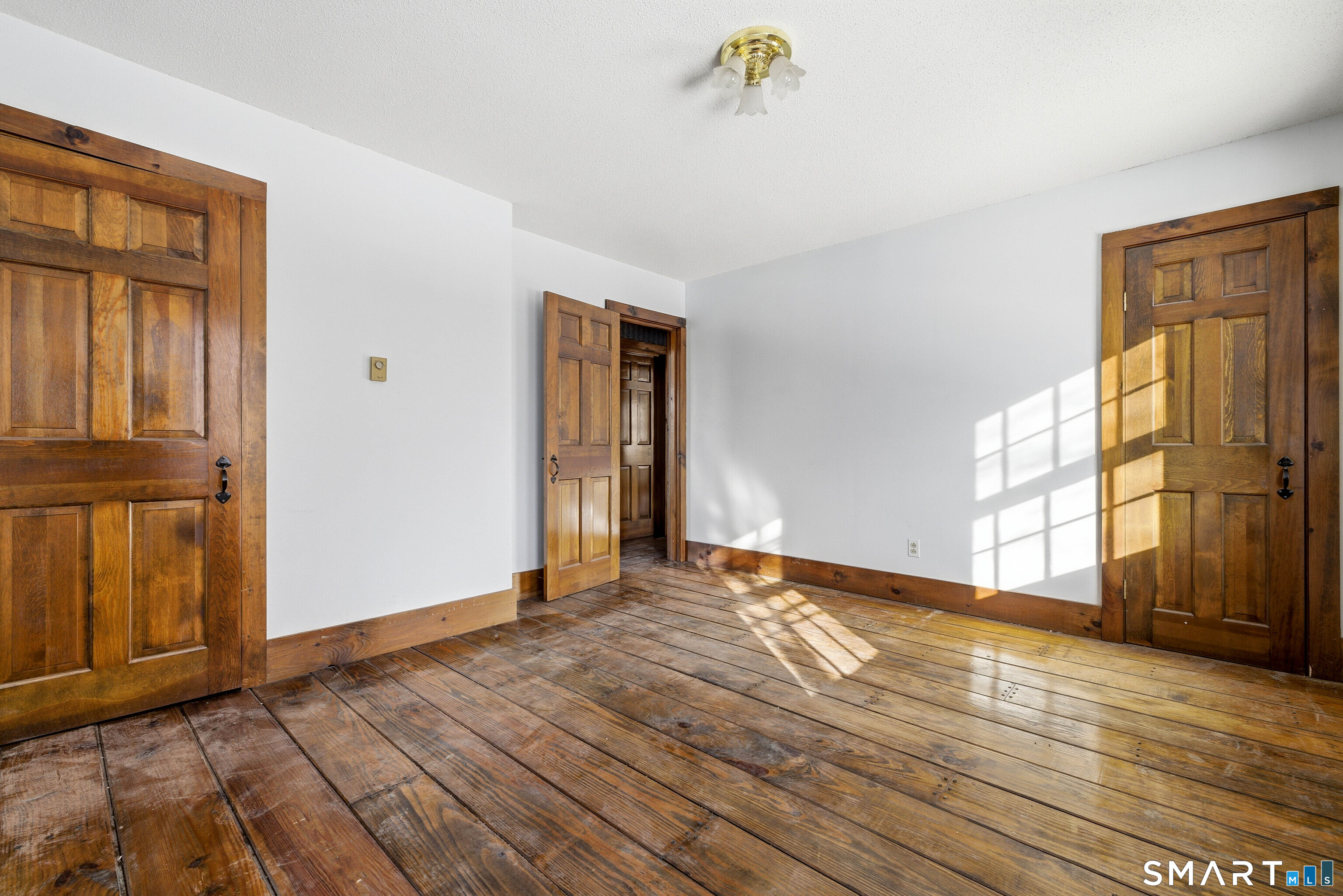 115 Melrose Road East Windsor, CT 06016 - Photo 22 of 28 a view of empty room with wooden floor and fan