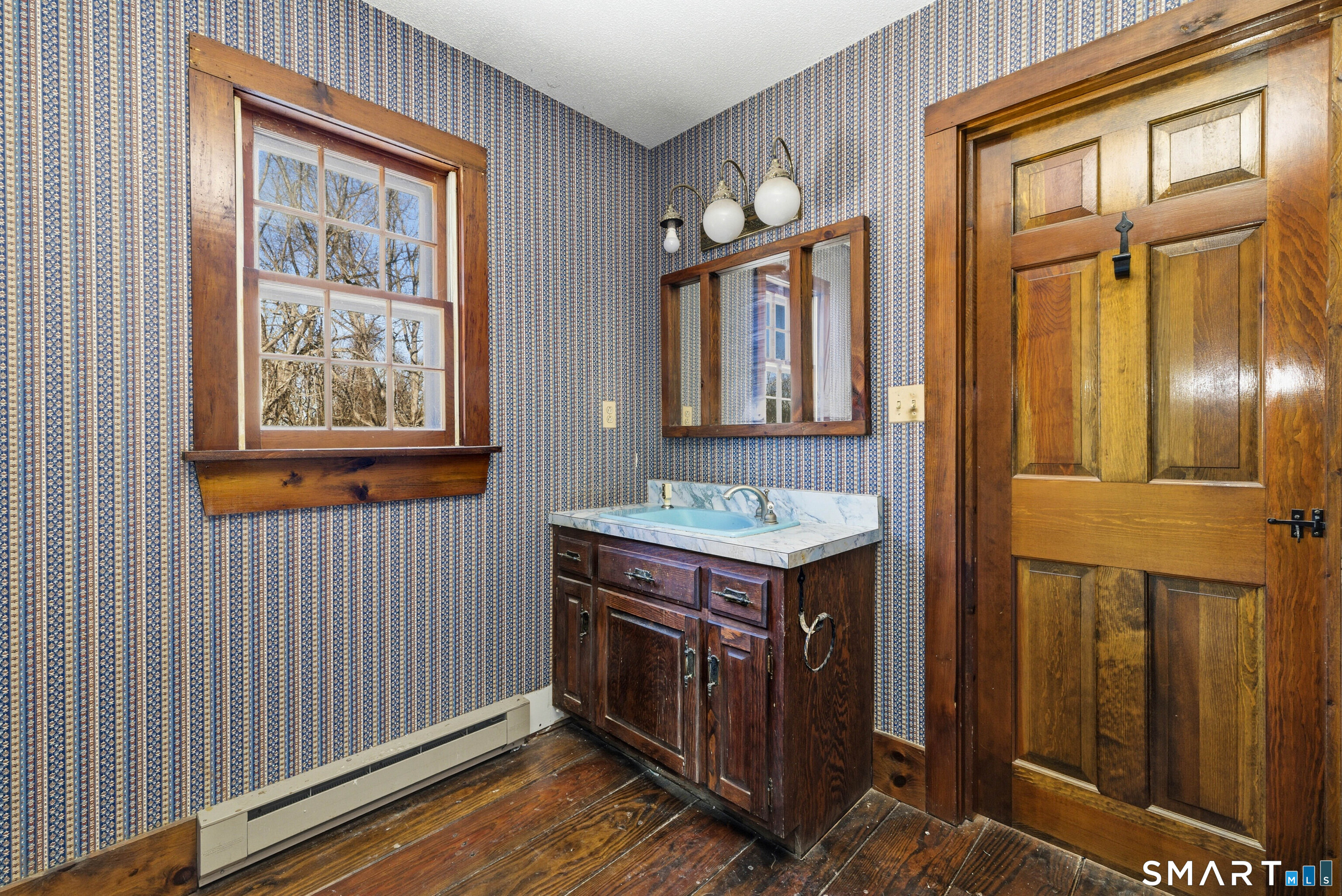 115 Melrose Road East Windsor, CT 06016 - Photo 25 of 28 a view of hallway with washer and dryer