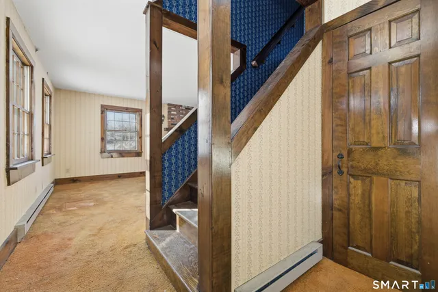 a view of an entryway with staircase