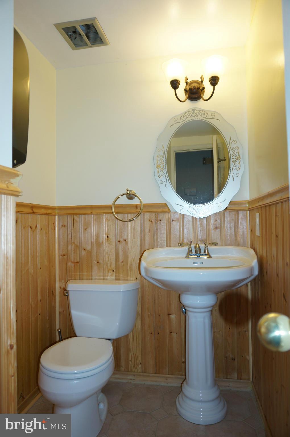 10906 Swansfield Road Columbia, MD 21044 - Photo 17 of 28 Remodeled Powder Room