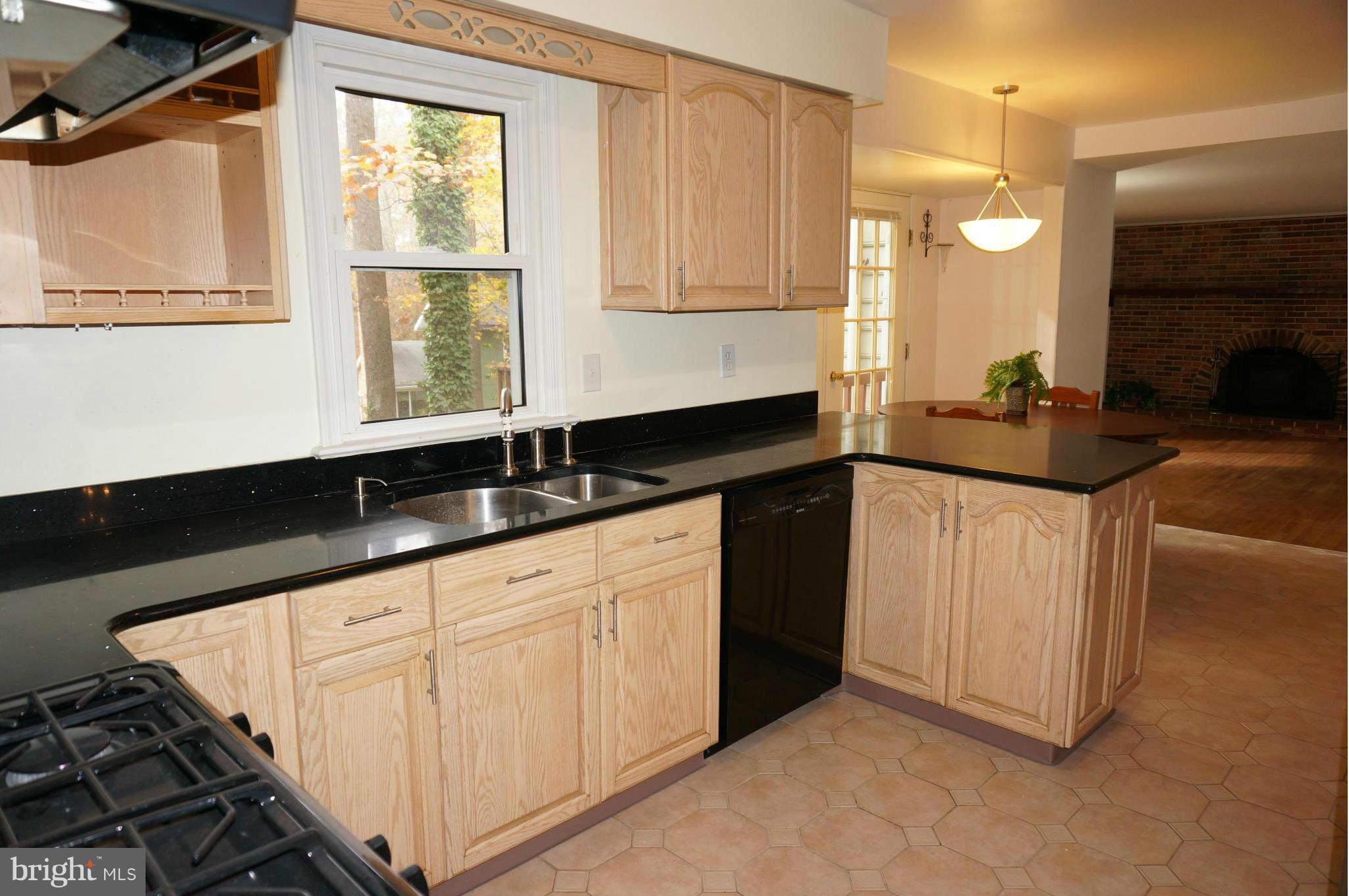 10906 Swansfield Road Columbia, MD 21044 - Photo 8 of 28 Kitchen to Family Room