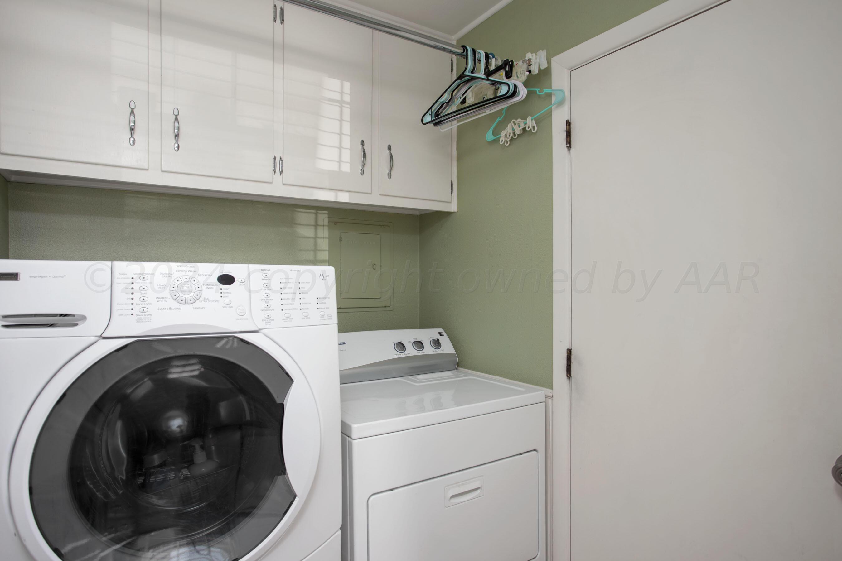 4406 South Bonham Street Amarillo, TX 79110 - Photo 12 of 26 a utility room with dryer and washer